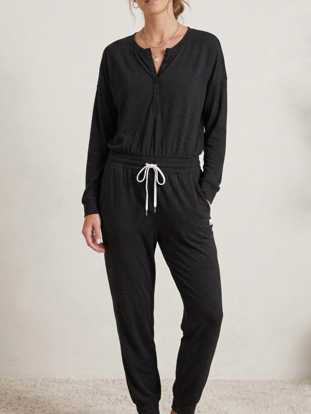 VUORI Lux Henley Jumpsuit Black Long Sleeve Drawstring Jogger